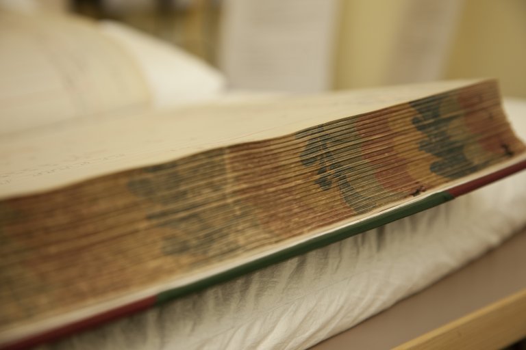 Photograph page ends of Camborne School of Mines Student Admissions register volume.