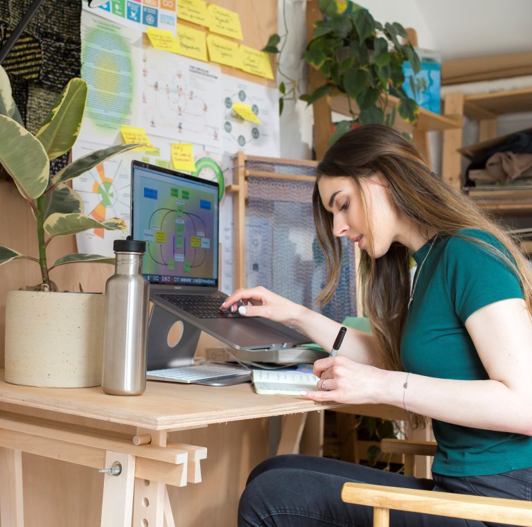 Student sitting at a computer to study