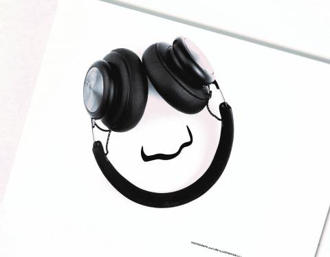 Headphones on a piece of paper